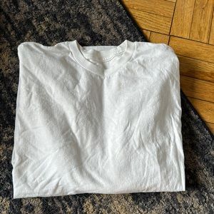 Long-sleeved white shirt.